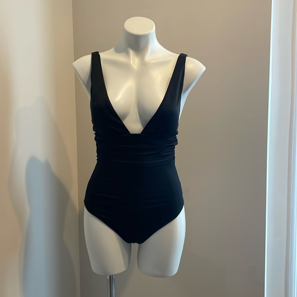 H&M woman’s black one piece.  Sz XXS